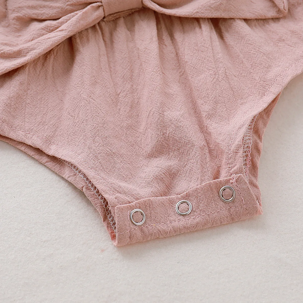 100% Cotton Solid Bowknot Decor Long-sleeve Baby Romper
