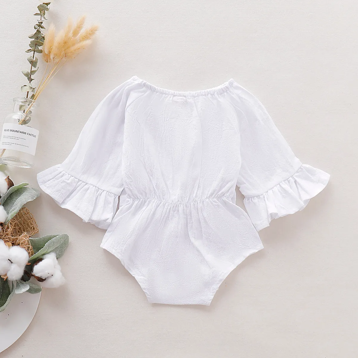 100% Cotton Solid Bowknot Decor Long-sleeve Baby Romper