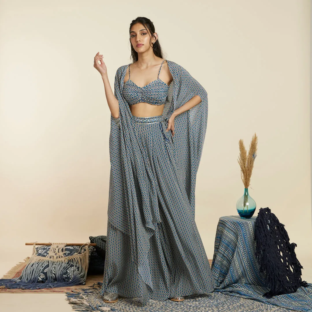 BLUE GEO BIKINI BUSTIER PAIRED WITH PLEATED PANTS