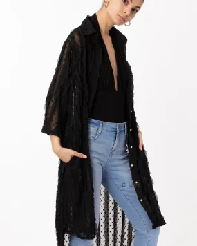 Oversized shirt dress in black with chiffon ruffle stripe design