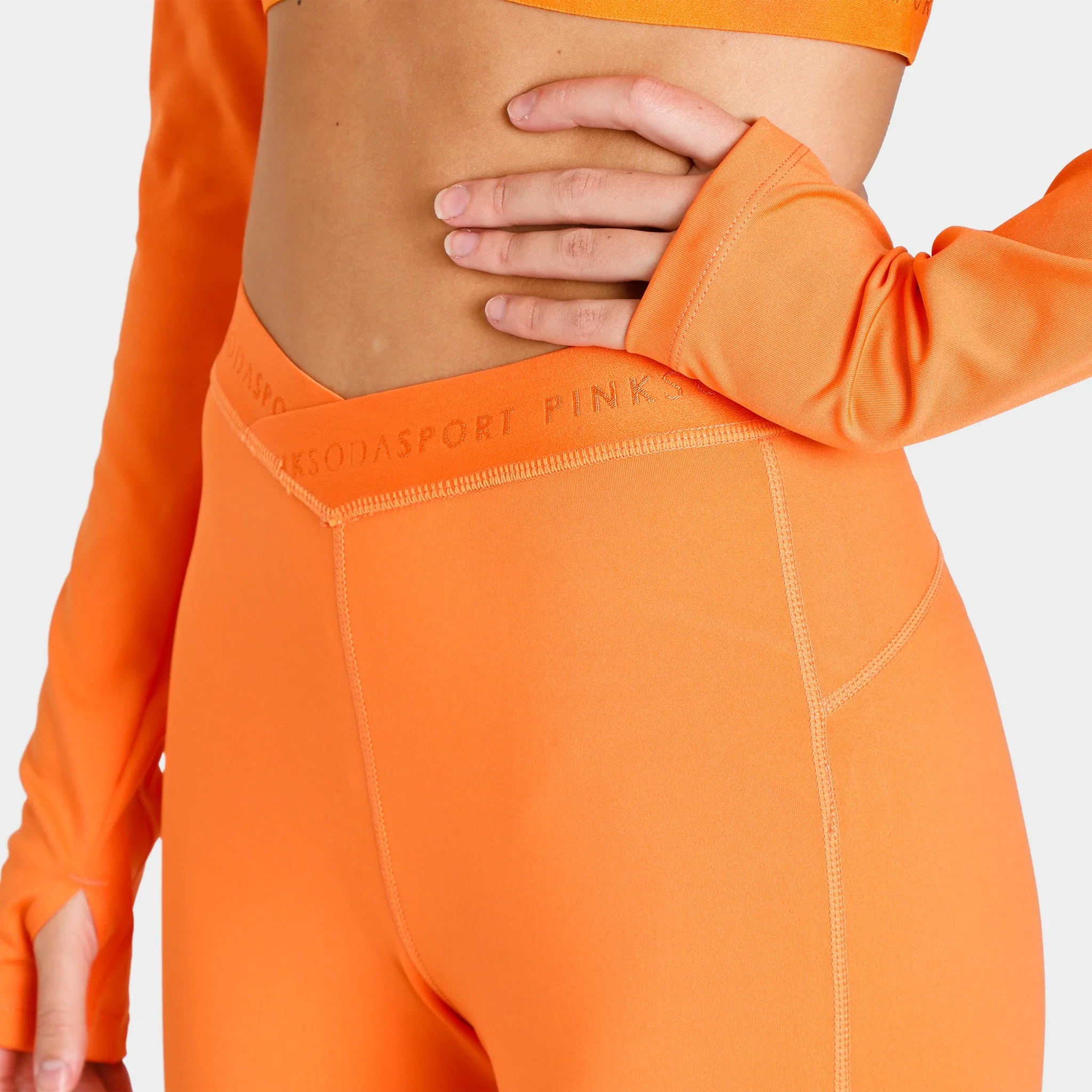Pink Soda Sport Women's Topanga Cross Tape Tights / Dusty Orange